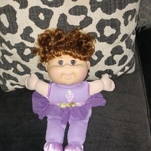 Purple Doll with Curly Hair